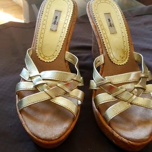 Platform sandals, used but still lots of life in them.  Price reflects condition